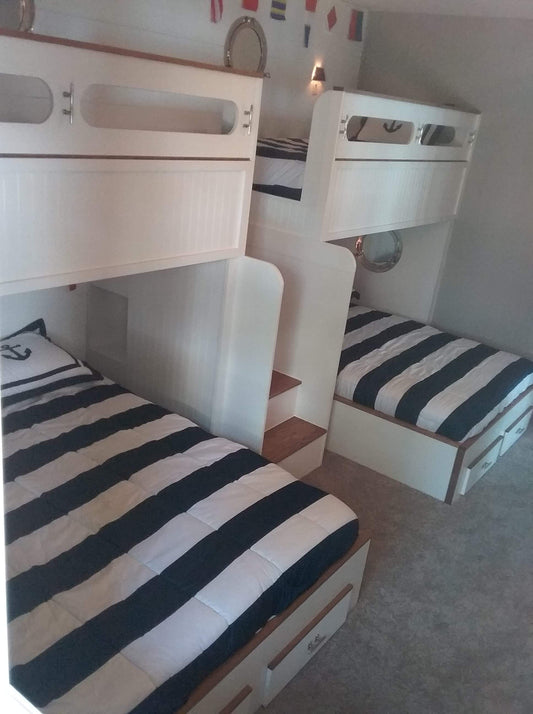 Nautical: High-Capacity Twin XL over Perpendicular Queen Family Suite